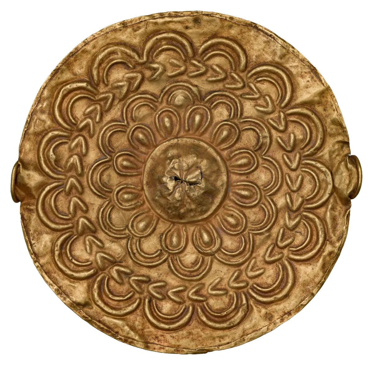 A round gold disc with a raised rosette of looping petals around a domed centre.